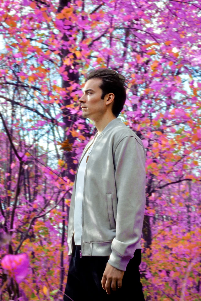 engimono in profile among pink blossom